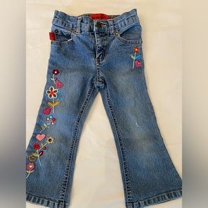 Gently used Size 2T girls flared denim jeans with flower and heart embroidery